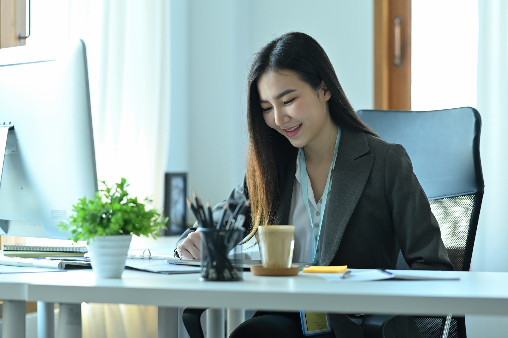 Photo of a young businesswoman working at the modern working
